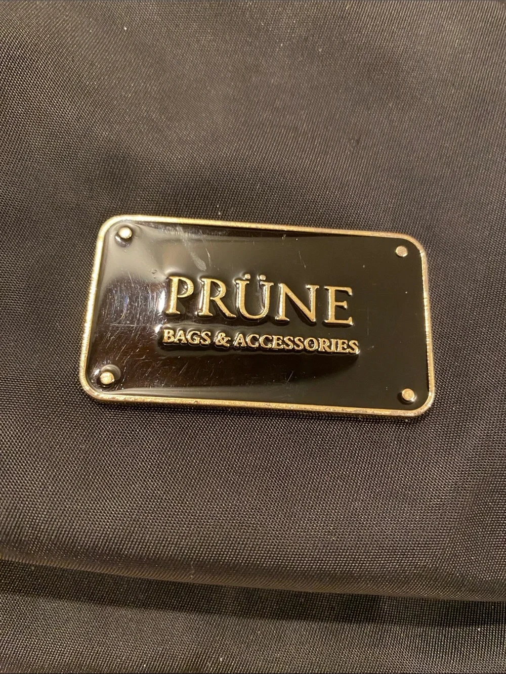 Prune Black Backpack with Gold-Tone Accents